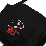 Alimenté par le tablier brodé Soca