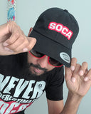 Ne sous-estimez jamais le chapeau de papa Soca