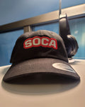 Ne sous-estimez jamais le chapeau de papa Soca